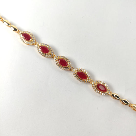 Gold-Plated Bracelet with Red Gemstones and White Zircon Accents