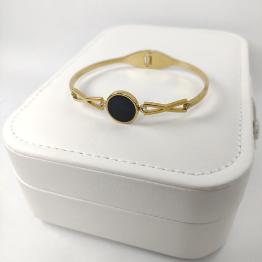 Gold-Plated Bracelet with Black Stone and Crystal Wing Accents