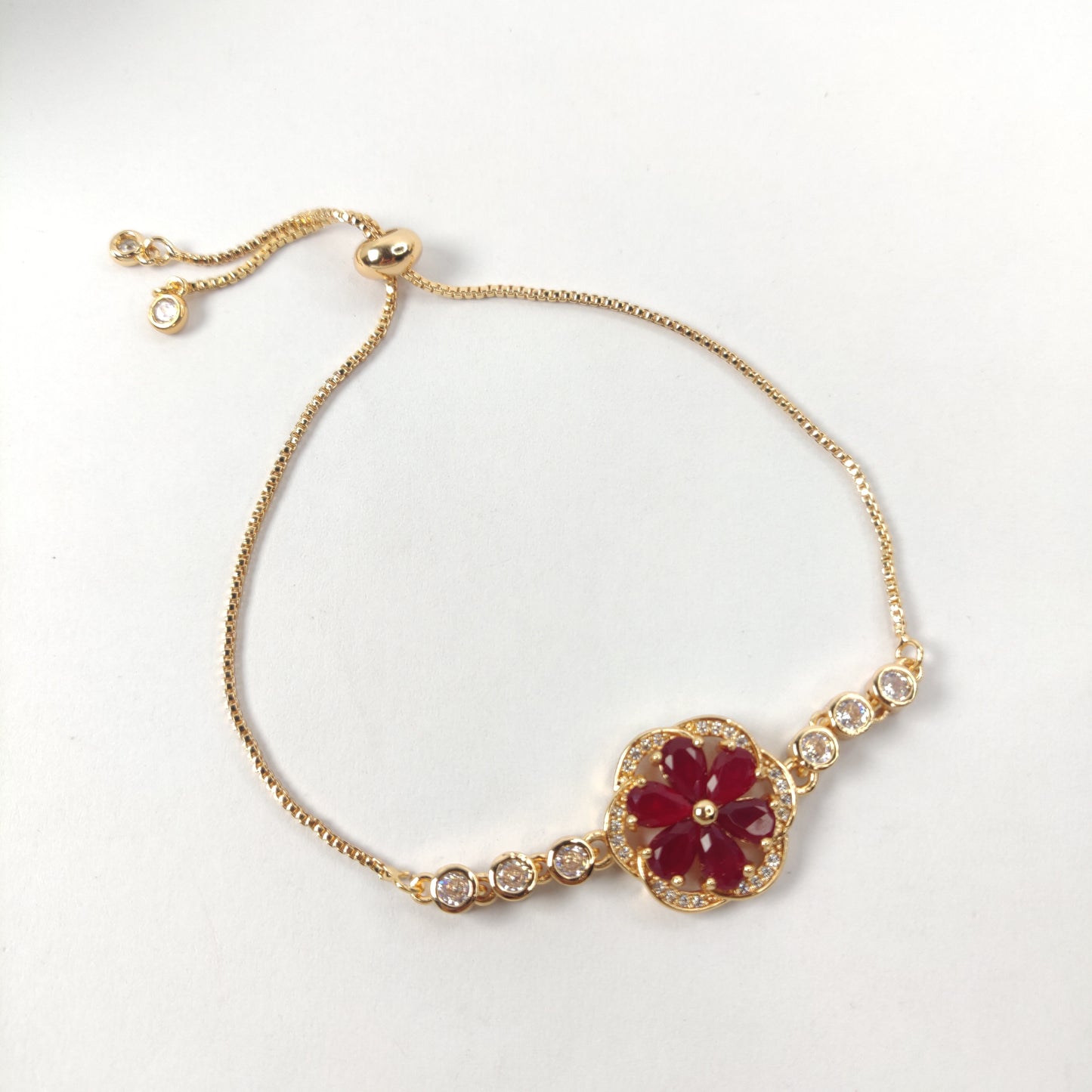 Gold Bracelet with Gemstone Flower Pendant