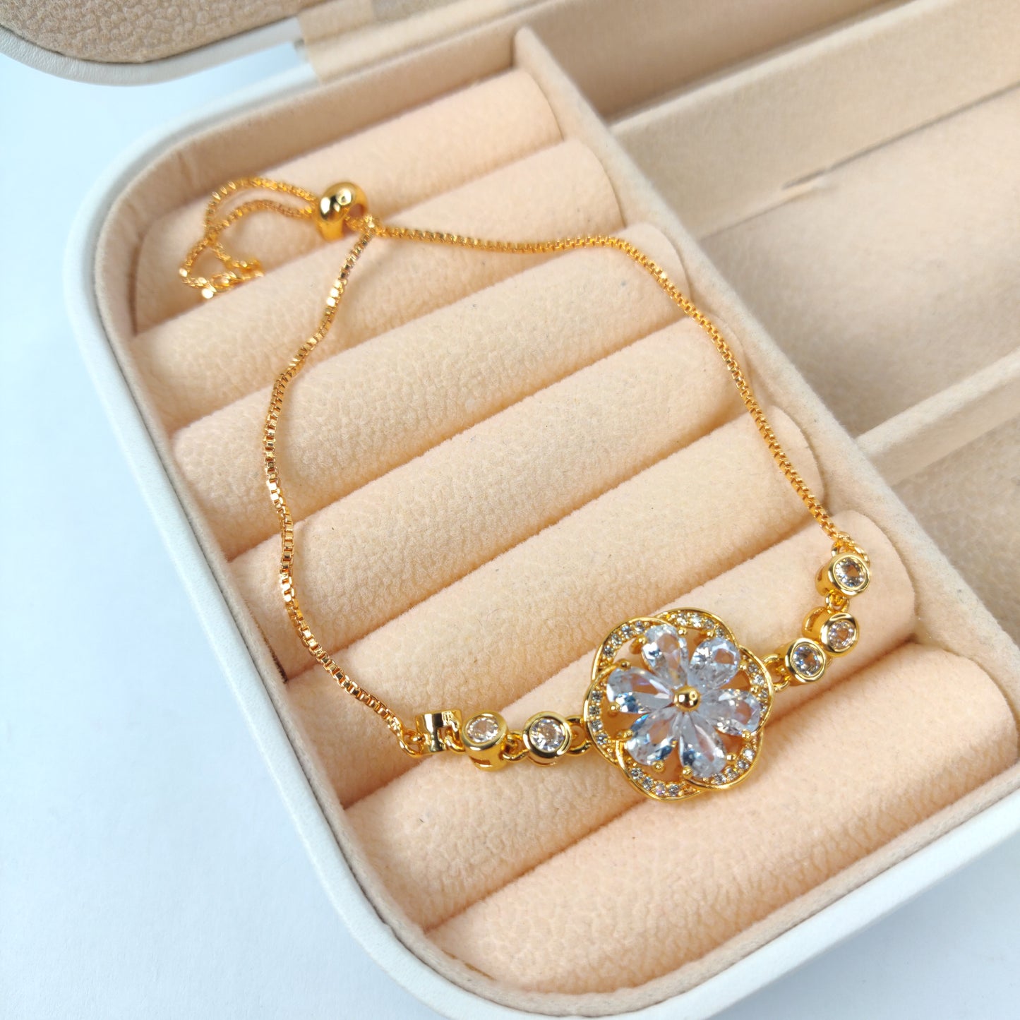 Gold Bracelet with Gemstone Flower Pendant